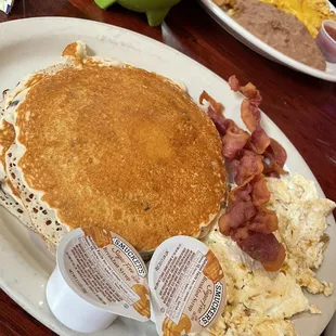 2 Pancakes chocolate chip!! With bacon and egg whites. Great bacon!