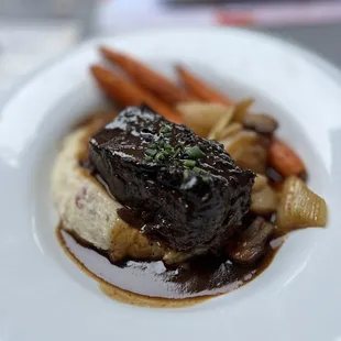 $29-Beef bourguignon with mashed potatoes, garden vegetables and truffle-red wine jus