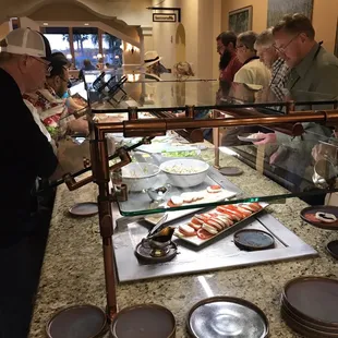 The salad bar starts with an appetizer and ends with French onion soup!