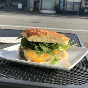 a sandwich with cheese and lettuce