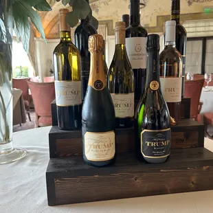 a variety of wine bottles on a table