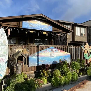 a surfboard and a surfboard sign