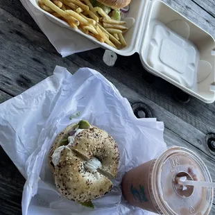 a bagel sandwich and french fries