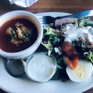 Cobb salad and tomato soup. I didn&apos;t care for the soup but the waiter kindly offered me a replacement. A wedding soup it was better