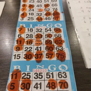 a table with bingo cards