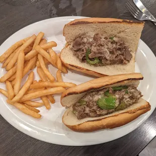 Cheese steak sub with fries
