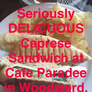 a plate of sandwiches and a drink