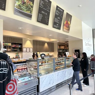 customers waiting in line to order food