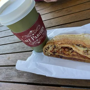 A delightful day outside at the cafe! Large latte &amp; raspberry walnut cookie!