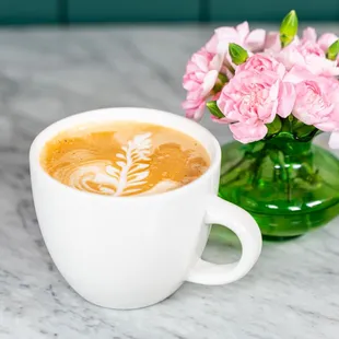 Yummy, warm and cozy latte. Choose your milk and flavor, honey cinnamon, vanilla, Cafe Olla and many more!