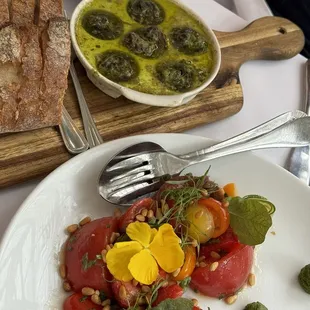 Escargot and the special summer salad (strawberries and tomatoes with pesto)
