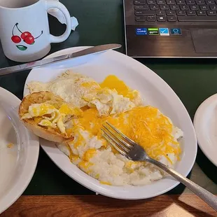 Country Fried Catfish w/ Eggs over medium, English muffin and cheese grits