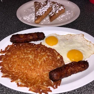 two plates of breakfast foods