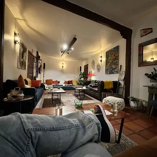 a person&apos;s legs resting on a table