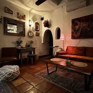 a living room with a red couch