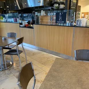 a table and chairs in a restaurant