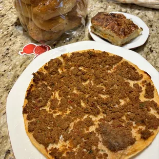 Armenian meat pizza -lahmajun
 And square cheese boreg phyllo with cheese in the middle.