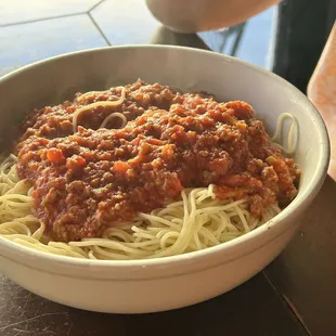 Angel hair pasta with meat sauce.
