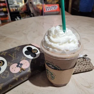 a cup of coffee with whipped cream