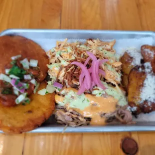 a plate of food on a wooden table