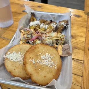 a plate of french toast with a side of coleslaw