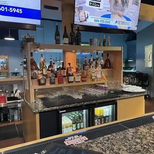 a bar with liquor bottles on it