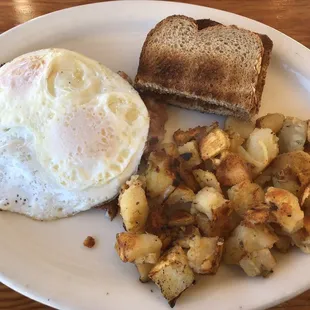 Corned beef hid under the egg.