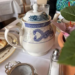 a teapot with a blue and white design