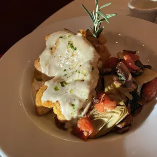 Tuscan chicken-lemon parsley cream sauce on chicken served with artichoke hearts