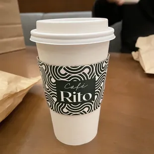 a cup of coffee on a table