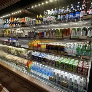 a refrigerated display of beverages