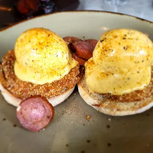 Robey&apos;s Benedict (two 5 min eggs, fried green tomato, andouille sausage, cajun hollandaise)