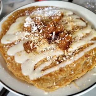 Carrot pancakes with cream cheese frosting and toasted coconut