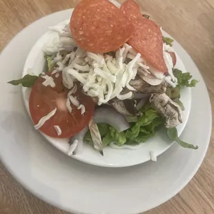 Italian salad that comes with the pastas.