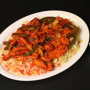 Red Tandoori seasoning tossed with our famous Chicken Suqaar for a spicy and authentic taste of Somali cuisine