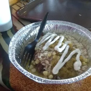 Shredded beef burrito bowl with pineapple salsa