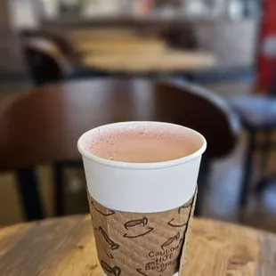pink chai with oat milk -- hot
