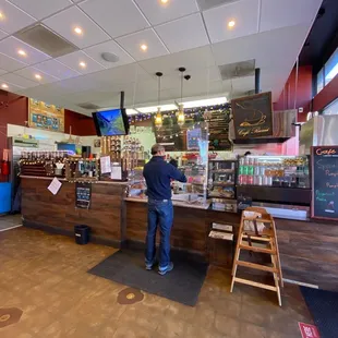 a man standing at the counter