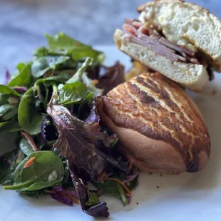 a sandwich and a salad on a plate