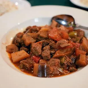 Eggplant Stewed with Meat (Patlican Guvec): beef, eggplant, tomato, green pepper, garlic, onion, tomato paste, pepper paste ($19.99).