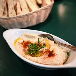 Hummus: chikpeas, tahini, lemon juice, olive oil ($7.99).
 Extra Homemade Bread ($2.99).