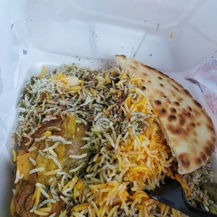 Pita bread saffron rice and lamb shank