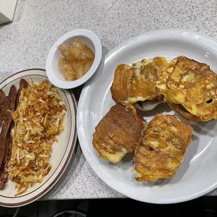 Cinnamon roll French toast, bacon cooked crispy and hashbrowns