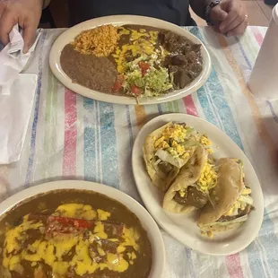 Cheese Enchiladas, Carne Guisada Puffy Tacos and a Carne Guisada w Enchilada plate.