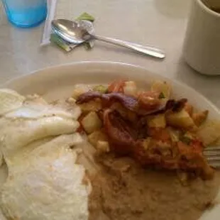 juevos rancheros! sauce is served on the side.