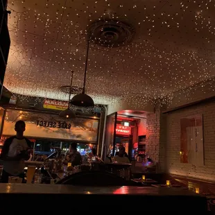 people sitting at the bar