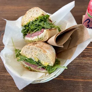 THE ITALIAN 12.95- ITALIAN DRY SALAMI, HOT MOZZARELLA, ARUGULA, OLIVE TAPENADE, BANANA PEPPERS, PESTO etc.