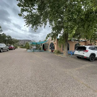 a parking lot with parked cars