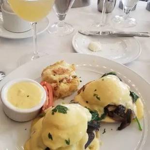 Eggs Benedict w spinach and mushrooms and a potato casserole