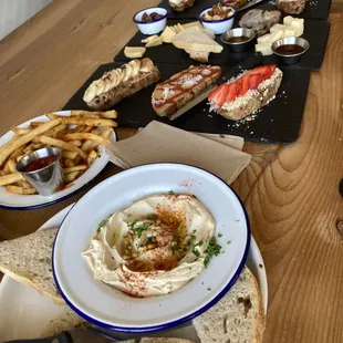The left was this hummus platter    The toast was a variety of different toppings